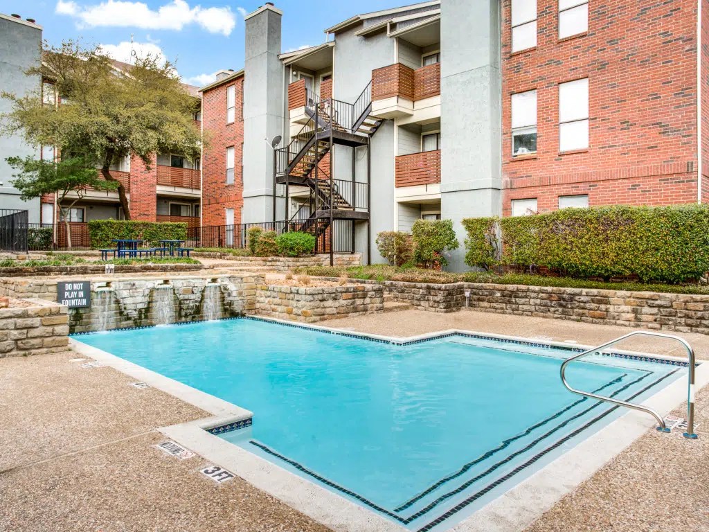 Apartment complex with swimming pool and fountain